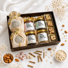 Load image into Gallery viewer, The Regal Fusion Box premium Diwali gift hamper with rose cashews, Indian spiced raisins, gourmet treats, and festive gift packaging