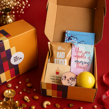 Load image into Gallery viewer, Healthy Munch Hamper premium Diwali gift hamper with wellness gifts, candle, healthy snacks, Ikigai book and festive gift box