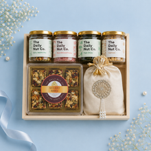 Load image into Gallery viewer, The Wellness Box premium Diwali gift hamper with healthy snacks, gourmet sweets, premium nuts, and festive gift packaging