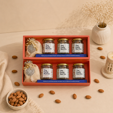 Load image into Gallery viewer, The Blush Luxe Box premium Diwali gift hamper with gourmet nuts, rose petal cashews, almonds, cranberry potli, and protein mix