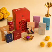 Load image into Gallery viewer, Premium Gourmet Festive Hamper with festive keepsakes, gourmet snacks, and elegant Diwali gift packaging for corporate and family gifting.