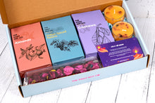 Load image into Gallery viewer, minimal luxury gift hamper with gourmet snacks candles and elegant festive decor