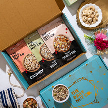 Load image into Gallery viewer, premium dry fruits hamper with cashews seed mix and health mix in pastel blue box