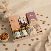Load image into Gallery viewer, The Wholesome Luxe Box premium Diwali gift hamper with gourmet cookies, almonds, protein mix, ragi sticks, and festive gift packaging
