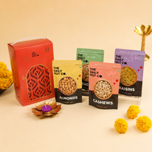 Load image into Gallery viewer, Premium Festive Dry Fruit Hamper with assorted dry fruits, decorative lantern gift box, tea light diyas, and elegant Diwali gifting essentials.

