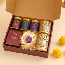 Load image into Gallery viewer, Premium Festive Hamper in a Diwali-themed gift box featuring gourmet snacks, festive décor, and elegant packaging for corporate Diwali gifting and festive celebrations.
